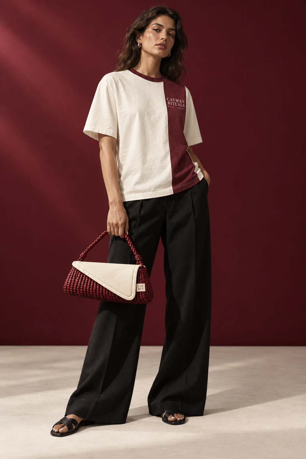 Generated model concept pairing the Oxblood Panel tee with The Ledge bag.