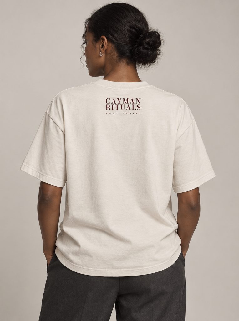 Studio render: the back of the shirt, with the Cayman Rituals signature below the collar.